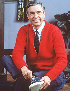 Photo of Fred Rogers in a red cardigan